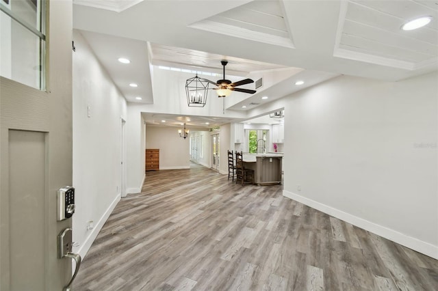 816 9th Ave SW, Largo, FL 33770 - living area with baseboards, ornamental molding, light wood-style floors, recessed lighting, and a ceiling fan