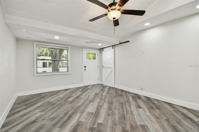 816 9th Ave SW, Largo, FL 33770 - entryway featuring healthy amount of natural light, baseboards, wood finished floors, recessed lighting, and wood ceiling