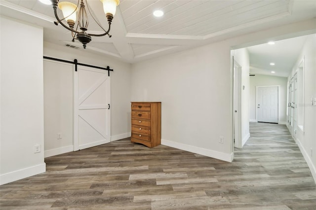 816 9th Ave SW, Largo, FL 33770 - empty room featuring recessed lighting, a barn door, a chandelier, baseboards, and crown molding