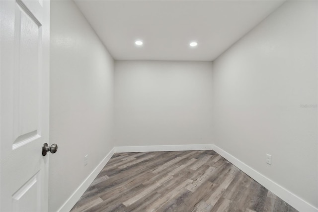 816 9th Ave SW, Largo, FL 33770 - spare room featuring recessed lighting, wood finished floors, and baseboards