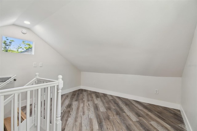 816 9th Ave SW, Largo, FL 33770 - bonus room with vaulted ceiling, wood finished floors, and baseboards