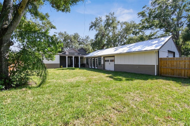 816 9th Ave SW, Largo, FL 33770 - view of yard with an attached garage