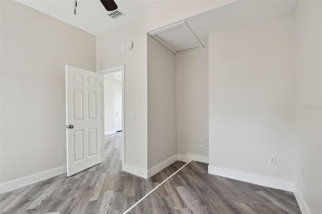 816 9th Ave SW, Largo, FL 33770 - unfurnished room featuring wood finished floors, ceiling fan, and baseboards