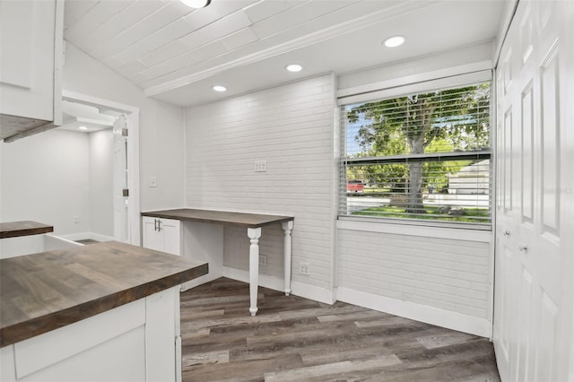 816 9th Ave SW, Largo, FL 33770 - unfurnished office featuring dark wood-style flooring, baseboards, lofted ceiling, and recessed lighting
