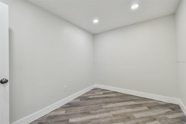 816 9th Ave SW, Largo, FL 33770 - unfurnished room featuring recessed lighting, baseboards, and wood finished floors