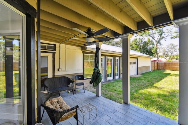 816 9th Ave SW, Largo, FL 33770 - view of patio / terrace with a garage and a ceiling fan