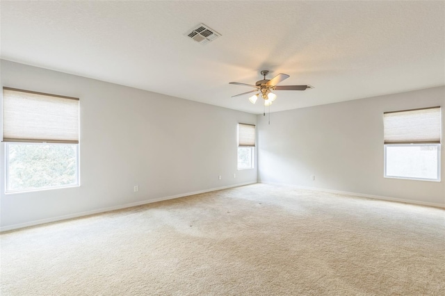 1769 Strathmore Cir, Mount Dora, FL 32757 - carpeted spare room featuring ceiling fan and baseboards
