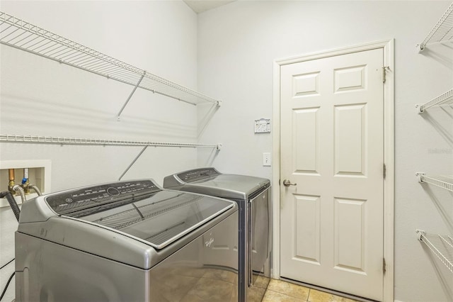 1769 Strathmore Cir, Mount Dora, FL 32757 - washroom featuring washer and dryer and light tile patterned floors