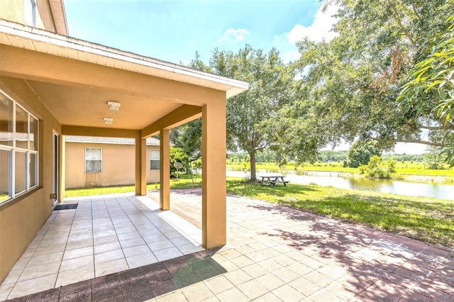 1769 Strathmore Cir, Mount Dora, FL 32757 - view of patio with a water view