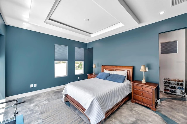 10722 Sumner Rd, Wimauma, FL 33598 - bedroom featuring a raised ceiling and baseboards