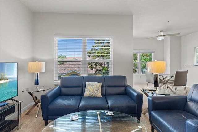 10764 70th Ave Unit 3206, Seminole, FL 33772 - living room featuring carpet floors, baseboards, and a ceiling fan