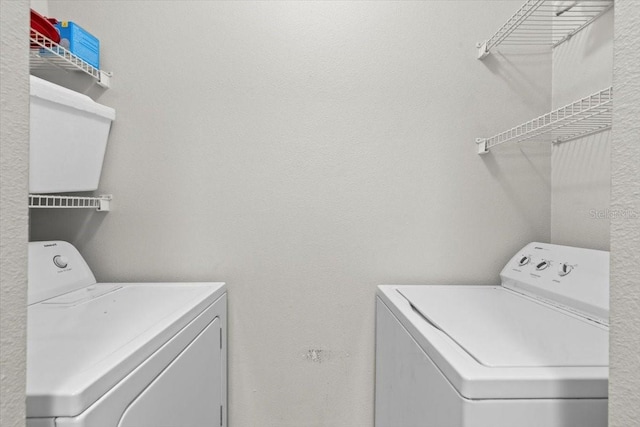 10764 70th Ave Unit 3206, Seminole, FL 33772 - laundry room with separate washer and dryer
