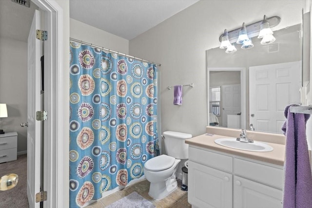 10764 70th Ave Unit 3206, Seminole, FL 33772 - bathroom featuring vanity, toilet, and a shower with shower curtain