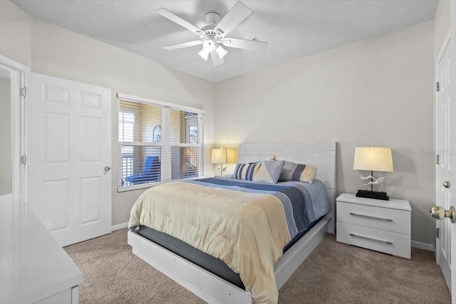 10764 70th Ave Unit 3206, Seminole, FL 33772 - bedroom featuring carpet floors, ceiling fan, and baseboards