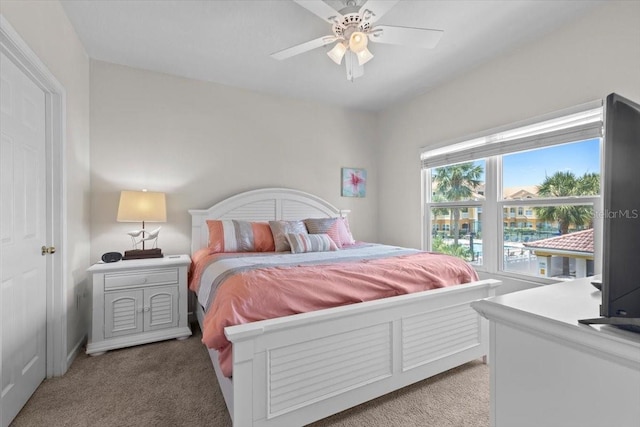 10764 70th Ave Unit 3206, Seminole, FL 33772 - bedroom with light colored carpet and ceiling fan