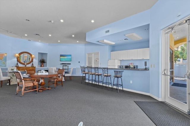 10764 70th Ave Unit 3206, Seminole, FL 33772 - dining space with recessed lighting and carpet flooring
