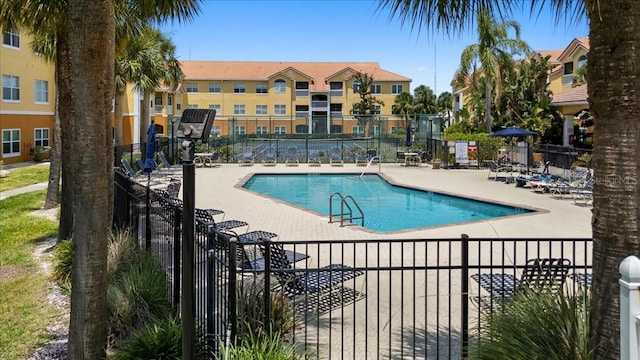 10764 70th Ave Unit 3206, Seminole, FL 33772 - community pool with a patio area