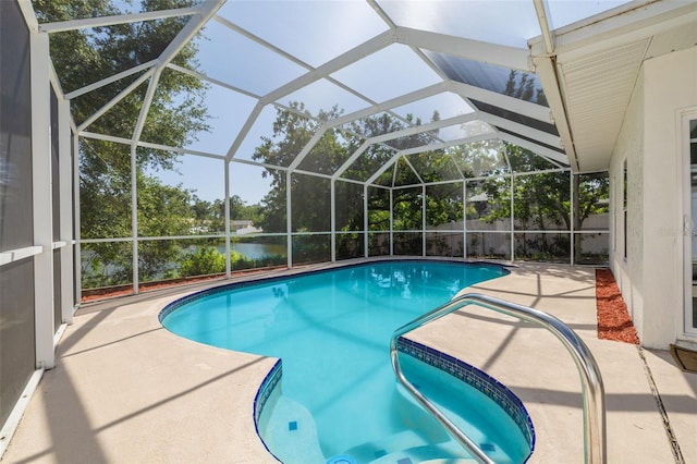 2436 Beacon Groves Blvd, Palm Harbor, FL 34683 - outdoor pool with a patio and a water view