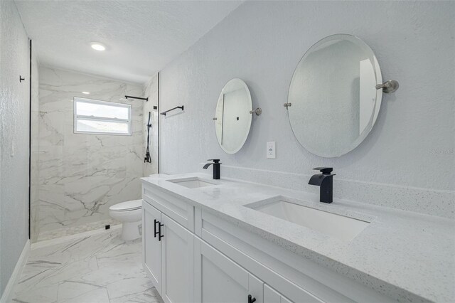 2436 Beacon Groves Blvd, Palm Harbor, FL 34683 - bathroom featuring marble finish floors, double vanity, a marble finish shower, toilet, and a textured ceiling