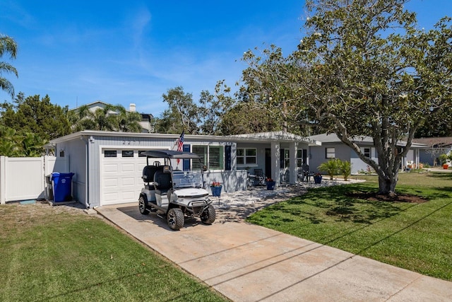2271 Carolyn Dr, Dunedin, FL 34698 - single story home featuring a garage and driveway