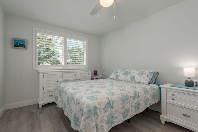 2271 Carolyn Dr, Dunedin, FL 34698 - bedroom featuring wood finished floors, baseboards, and ceiling fan