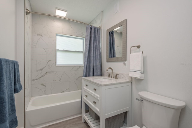 2271 Carolyn Dr, Dunedin, FL 34698 - bathroom with toilet, vanity, and shower / bath combination with curtain