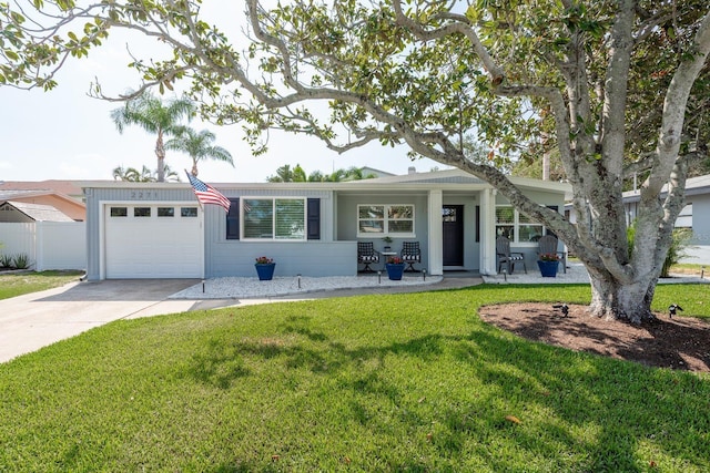 2271 Carolyn Dr, Dunedin, FL 34698 - view of front facade with a garage and driveway