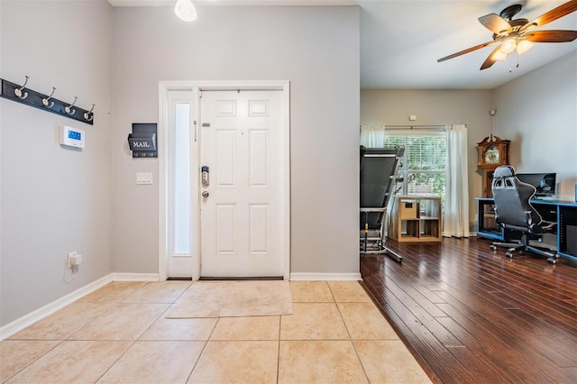 1524 Rhodeswell Ln, Dover, FL 33527 - foyer entrance featuring a ceiling fan, baseboards, and tile patterned flooring