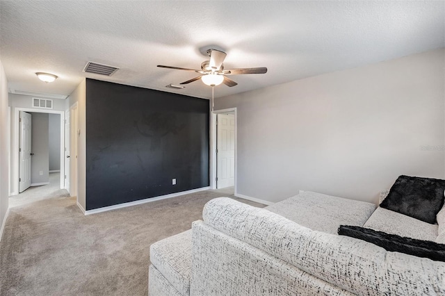 1524 Rhodeswell Ln, Dover, FL 33527 - bedroom with light carpet, baseboards, and a ceiling fan