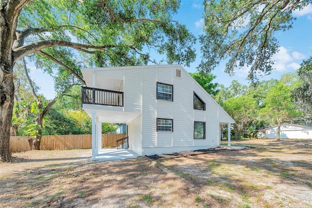 8521 N 29th St, Tampa, FL 33604 - back of house with a balcony
