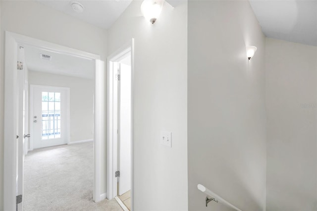8521 N 29th St, Tampa, FL 33604 - corridor featuring light carpet and baseboards