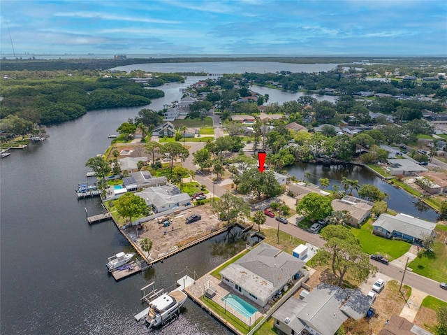 320 Tallahassee Dr NE, Saint Petersburg, FL 33702 - aerial perspective of suburban area featuring a large body of water