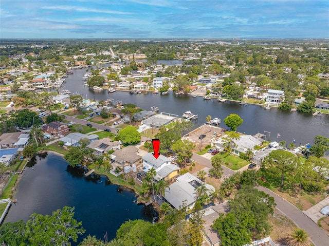 320 Tallahassee Dr NE, Saint Petersburg, FL 33702 - aerial view of property's location featuring a nearby body of water and nearby suburban area