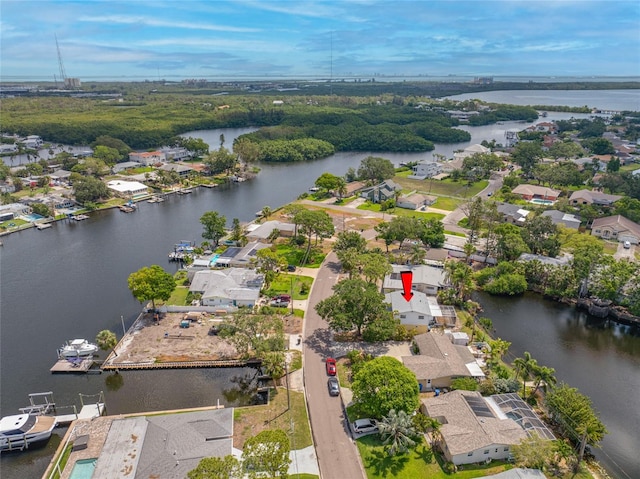 320 Tallahassee Dr NE, Saint Petersburg, FL 33702 - aerial view of property's location with nearby suburban area and a large body of water