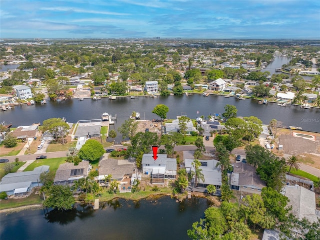 320 Tallahassee Dr NE, Saint Petersburg, FL 33702 - aerial view of property and surrounding area with nearby suburban area and a large body of water
