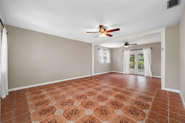 320 Tallahassee Dr NE, Saint Petersburg, FL 33702 - empty room with ceiling fan, light tile patterned flooring, and baseboards