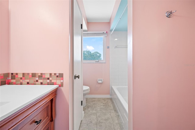 320 Tallahassee Dr NE, Saint Petersburg, FL 33702 - bathroom featuring vanity, toilet, tile patterned flooring, and shower / bath combination
