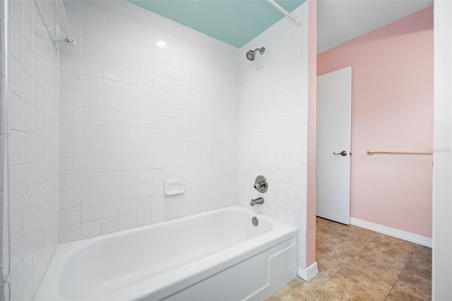 320 Tallahassee Dr NE, Saint Petersburg, FL 33702 - full bathroom with bathtub / shower combination, baseboards, and tile patterned flooring