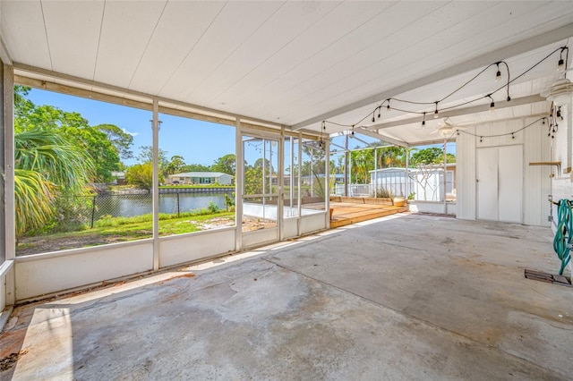 320 Tallahassee Dr NE, Saint Petersburg, FL 33702 - unfurnished sunroom with a water view