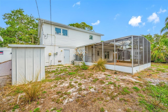 320 Tallahassee Dr NE, Saint Petersburg, FL 33702 - back of property featuring glass enclosure