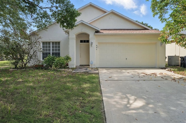 442 Graystone Blvd, Davenport, FL 33837 - view of front of property with stucco siding, an attached garage, concrete driveway, central AC unit, and a front yard