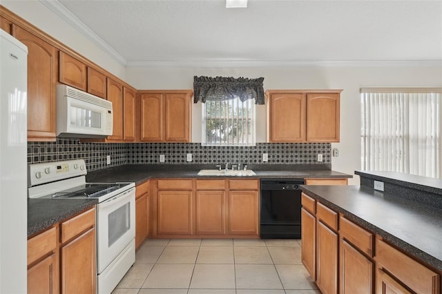 442 Graystone Blvd, Davenport, FL 33837 - kitchen with white appliances, a sink, crown molding, dark countertops, and backsplash