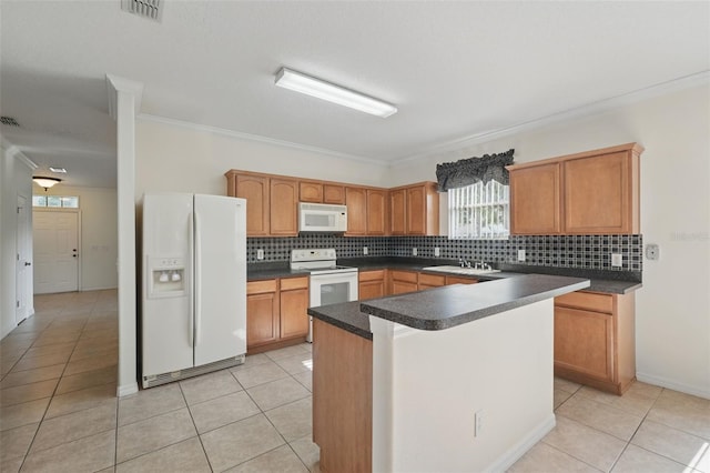 442 Graystone Blvd, Davenport, FL 33837 - kitchen featuring white appliances, light tile patterned flooring, crown molding, tasteful backsplash, and dark countertops