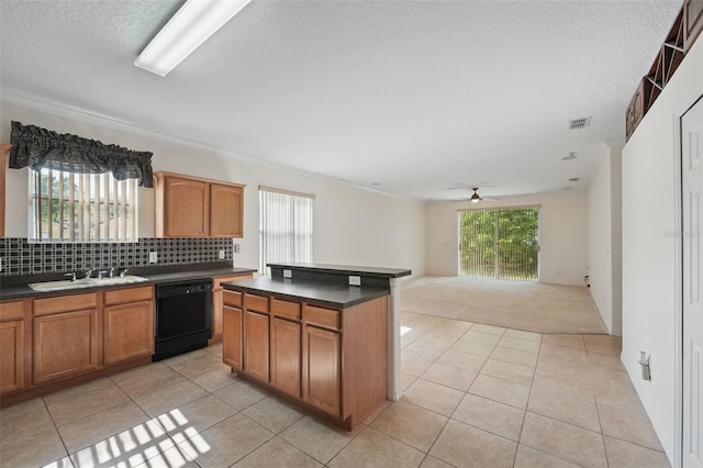 442 Graystone Blvd, Davenport, FL 33837 - kitchen featuring black dishwasher, a sink, a ceiling fan, dark countertops, and light tile patterned floors