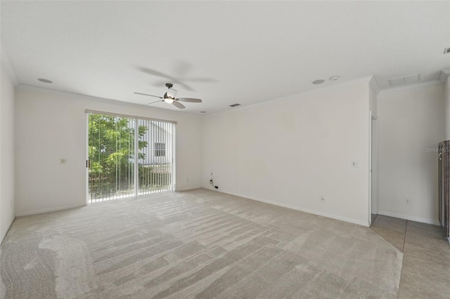 442 Graystone Blvd, Davenport, FL 33837 - unfurnished room with crown molding, a ceiling fan, light colored carpet, and baseboards