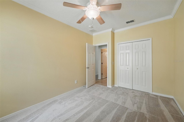 442 Graystone Blvd, Davenport, FL 33837 - unfurnished bedroom with light colored carpet, baseboards, ornamental molding, a closet, and ceiling fan