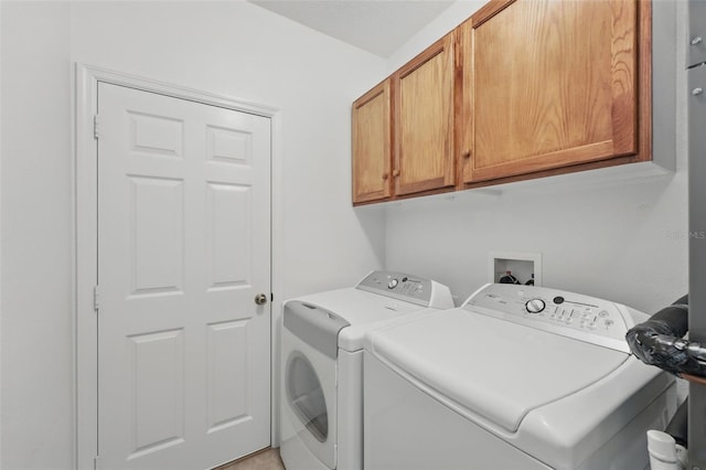 442 Graystone Blvd, Davenport, FL 33837 - laundry room featuring cabinet space and washer and dryer