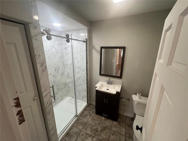 18127 US Highway 41, Spring Hill, FL 34610 - bathroom featuring a shower stall, toilet, vanity, tile patterned floors, and baseboards