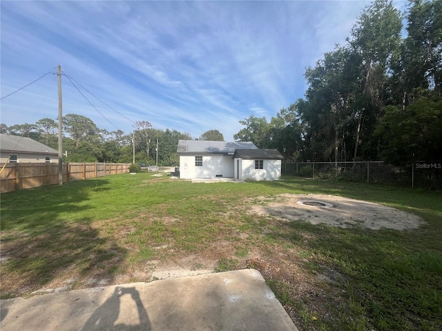 18127 US Highway 41, Spring Hill, FL 34610 - view of yard featuring a fire pit