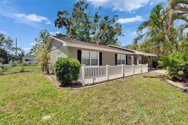 206 4th Ave NW, Ruskin, FL 33570 - view of front of property with stucco siding